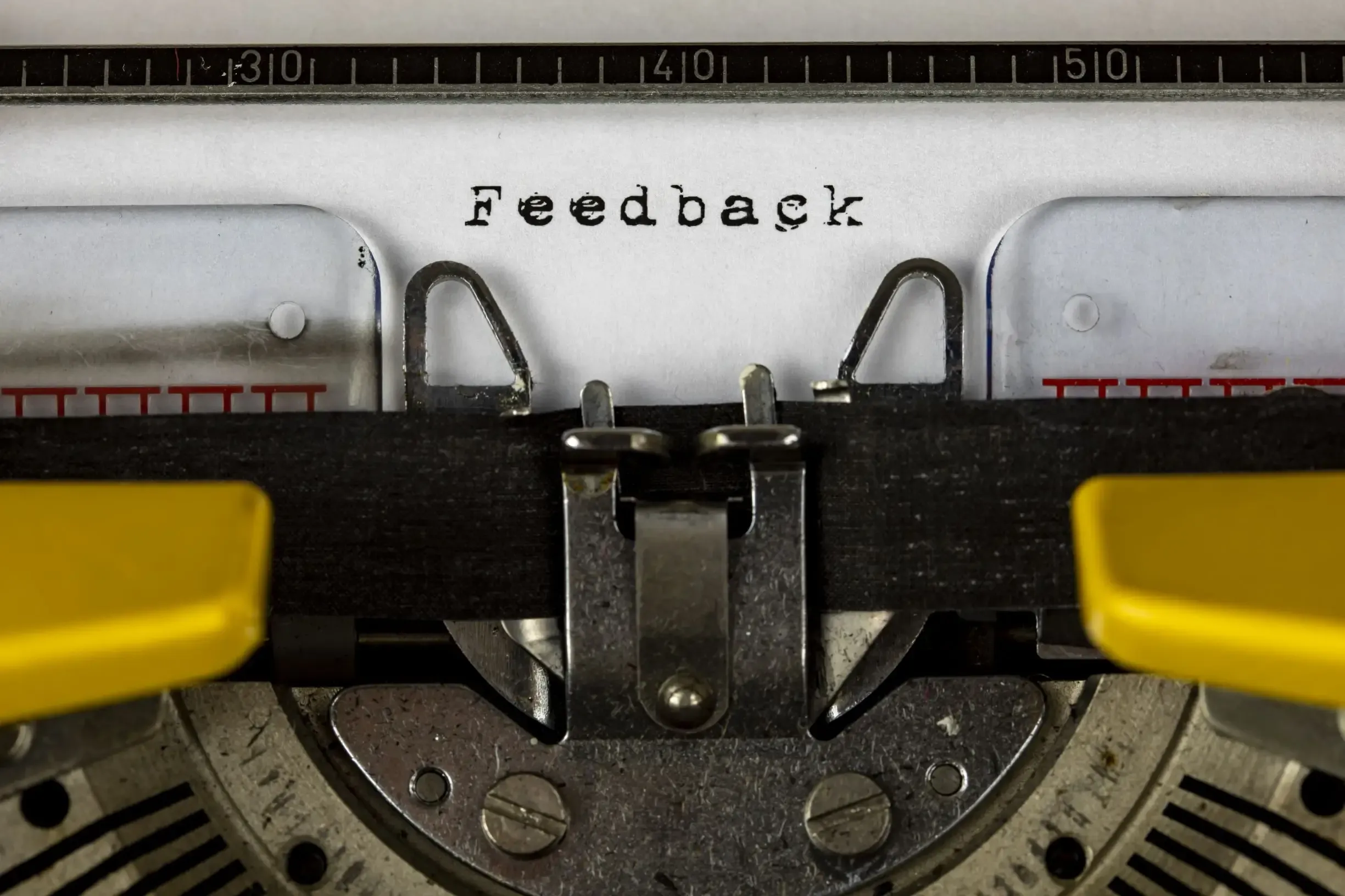 Person writing a blog post on a computer